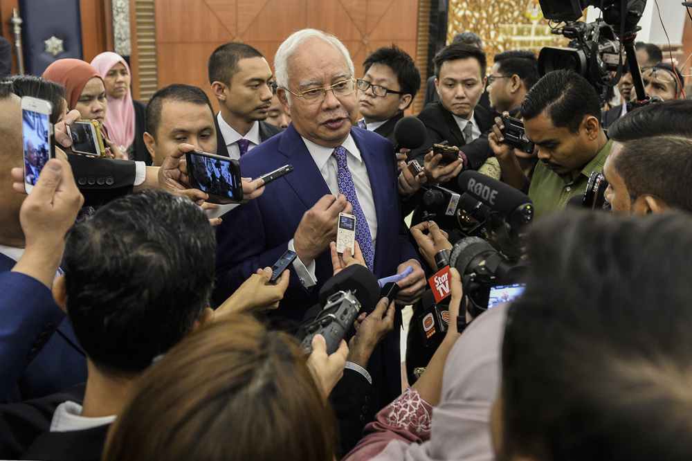 Najib’s trial today ended earlier to allow him to join in the parliamentary debates and voting, as the judge recognised the importance of the Undi 18 Bill. ― Picture by Miera Zulyana