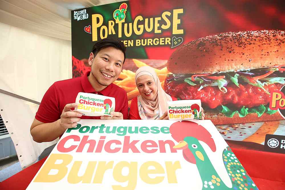 McDonaldu00e2u20acu2122s Malaysia marketing director Eugene Lee (left) and vice president and chief marketing officer Melati Abdul Hai unveil the Portuguese Chicken Burger. u00e2u20acu201d Picture courtesy of McDonaldu00e2u20acu2122s Malaysia