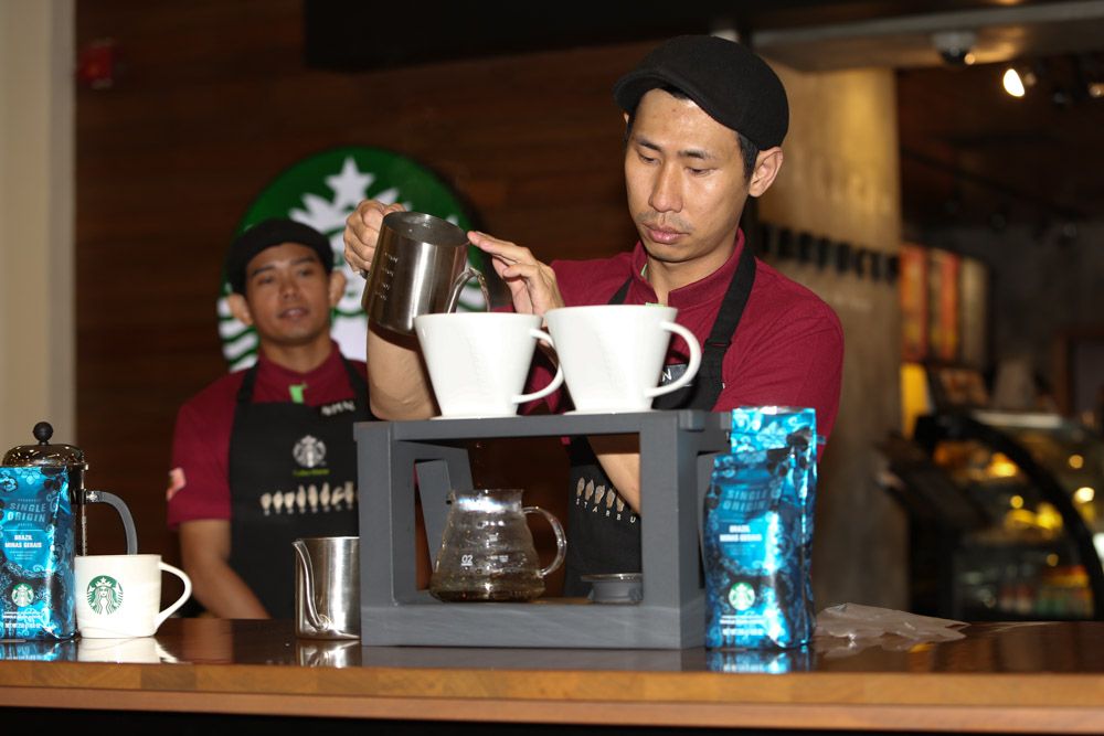 Yap Yee Lin demonstrating the proper way to brew coffee using the “Pour Over” brewing method.