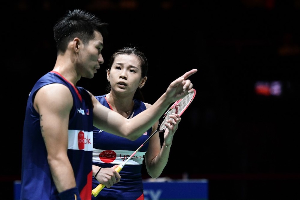 Malaysiau00e2u20acu2122s Chan Peng Soon and Goh Liu Ying react during their mixed doubles quarter-final match against Japanu00e2u20acu2122s Yuta Watanabe and Arisa Higashino during the 2019 BWF Badminton World Championships in Basel August 23, 2019. u00e2u20acu201d AFP pic