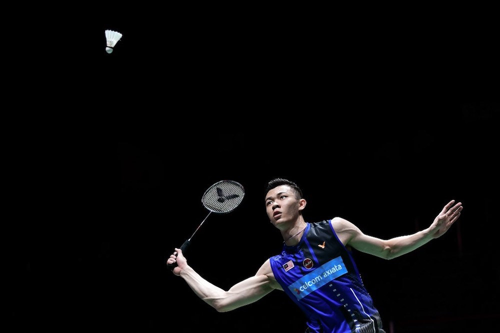 Malaysiau00e2u20acu2122s Lee Zii Jia returns the shuttlecock during his menu00e2u20acu2122s singles quarter-final match against Japanu00e2u20acu2122s Kento Momota at the 2019 BWF Badminton World Championships in Basel August 23, 2019. u00e2u20acu201d AFP pic