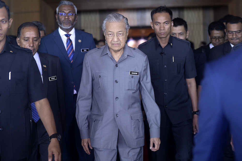 Prime Minister Tun Mahathir Mohamad arrives for a roundtable discussion with international chambers of commerce at the Putrajaya International Convention Centre August 1, 2019. — Picture by Shafwan Zaidon