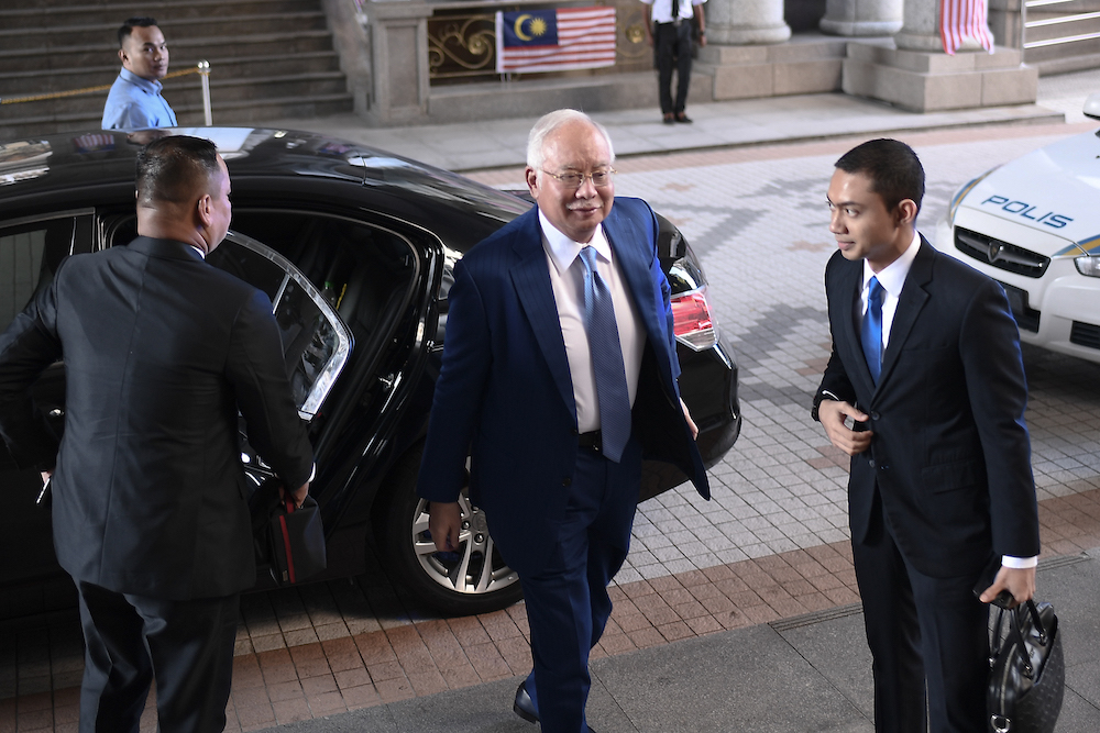 Datuk Seri Najib Razak arrives at the Palace of Justice in Putrajaya August 13, 2019. u00e2u20acu201d Picture by Shafwan Zaidon
