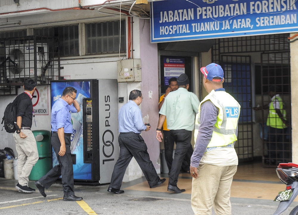 A team from Kuala Lumpur Hospital’s pathology department arrives at Tuanku Ja’afar Hospital in Seremban August 14, 2019, ahead of a post-mortem on the body of Irish teen Nora Anne Quoirin. — Picture by Shafwan Zaidon
