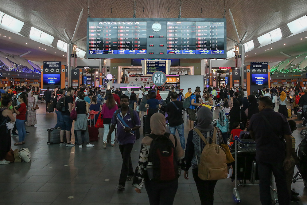 Passengers are seen at KLIA2 in Sepang August 22, 2019, during a systems outage. u00e2u20acu201d Picture by Yusof Mat Isa
