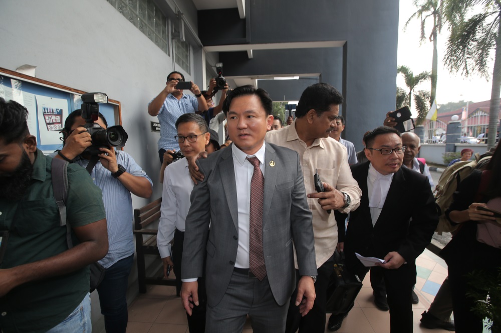 Perak state executive councillor Paul Yong walks to the Sessions Court in Ipoh where he is expected to be charged with rape on August 23, 2019. — Picture by Farhan Najib