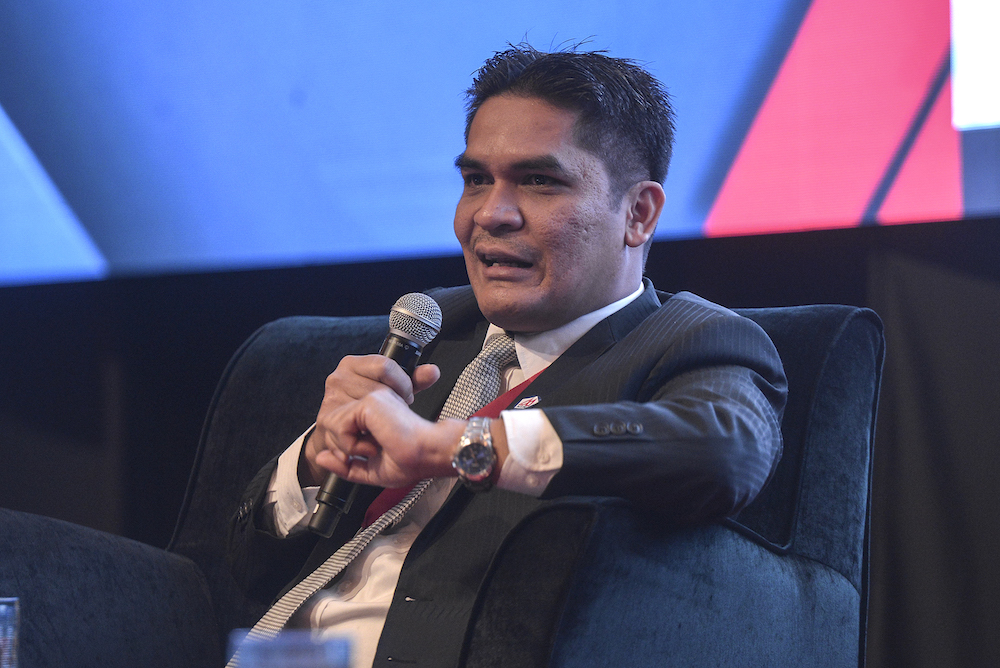 Deputy Economic Affairs Minister Radzi Jidin speaks during the National Economic Forum 2019 in Kuala Lumpur August 29, 2019. u00e2u20acu201d Picture by Shafwan Zaidon