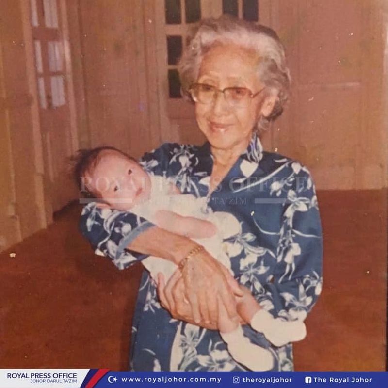 The Permaisuri of Johor Raja Zarith Sofiah Sultan Idris Shahu00e2u20acu2122s grandmother cradling an infant Tunku Mahkota Johor Tunku Ismail Sultan Ibrahim. u00e2u20acu201d Picture via the Royal Johor Facebook page 
