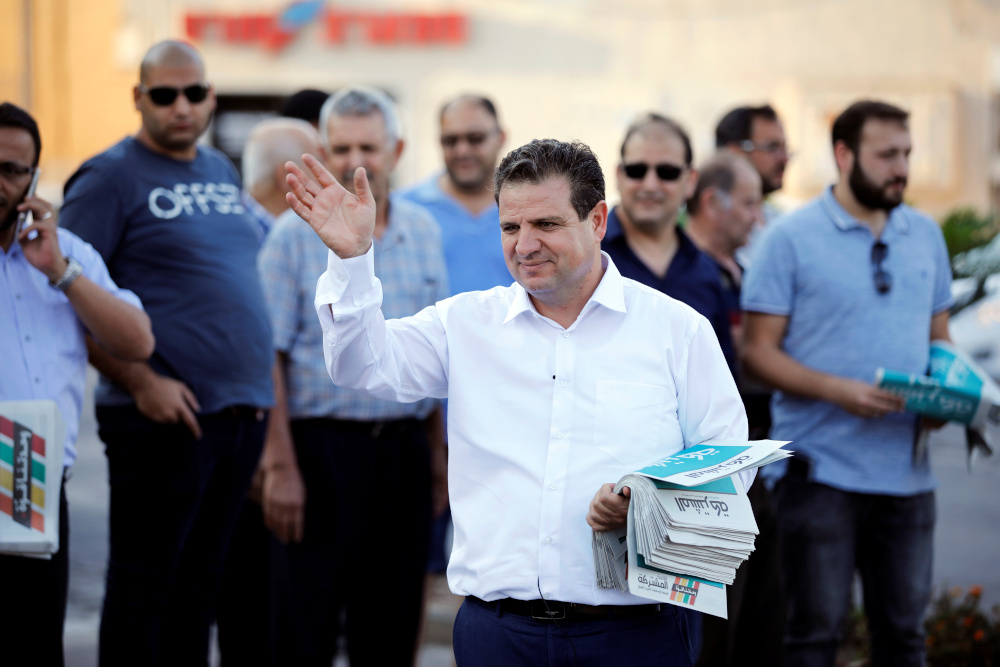 Ayman Odeh, leader of the Joint List, gestures as he hands out pamphlets during an an election campaign event in Tira, northern Israel September 5, 2019. u00e2u20acu201d Reuters pic 