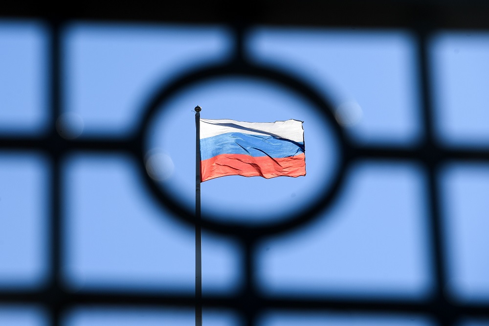 A Russian flag is seen at the top of the Moscow City Court building in Moscow on April 15, 2019. — AFP pic