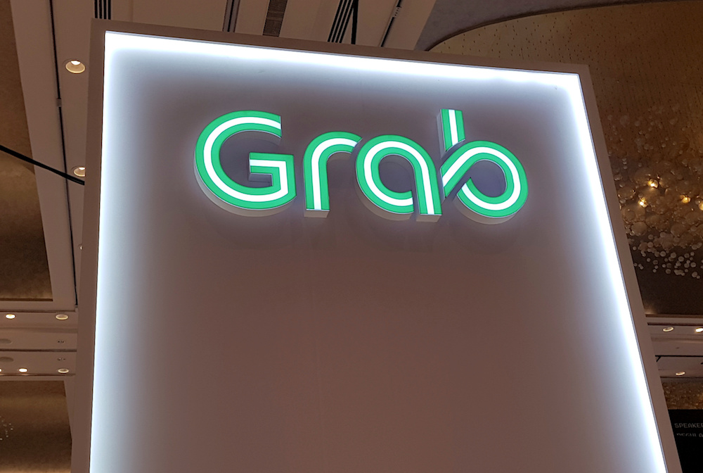 A Grab logo is pictured at the Money 20/20 Asia Fintech Trade Show in Singapore March 21, 2019. u00e2u20acu201d Reuters pic