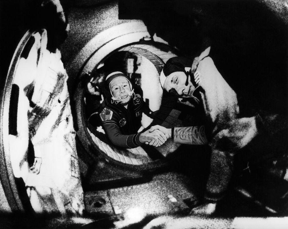 File photo taken on July 17, 1975 shows Commander of the Soviet crew of Soyuz, Alexei Leonov (left) and commander of the US crew of Apollo, Thomas Stafford, shaking hands after the Apollo-Soyuz docking manoeuvres. u00e2u20acu201dNasa/AFP pic