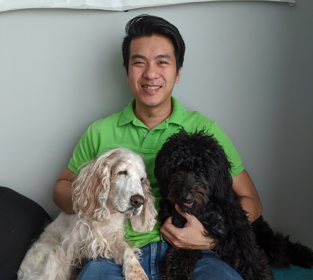 Tan with his two loving dogs. u00e2u20acu201d Picture courtesy of Louis Tann