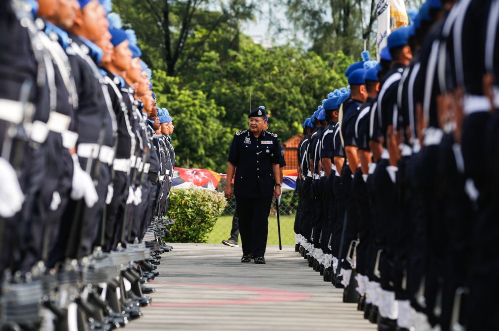 Inspector-General of Police Tan Sri Abdul Hamid Bador inspects a police squad at the Marine Police headquarters in Batu Uban, George Town October 10, 2019. u00e2u20acu201d Picture by Sayuti Zainudin