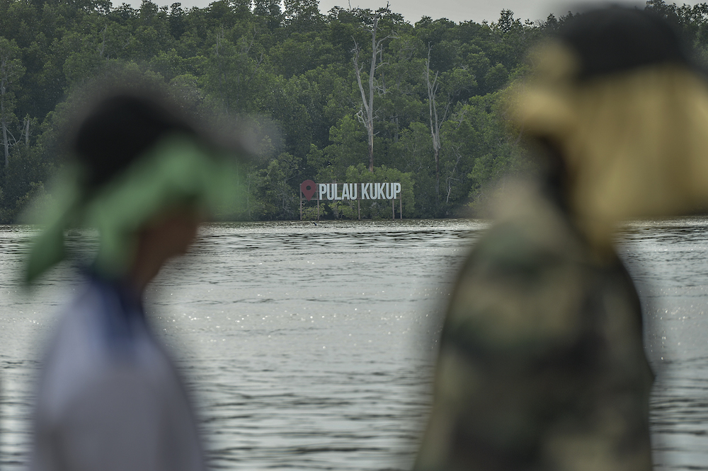 A Pulau Kukup sign on a mangrove island is seen from Kampung Air Masin in Kukup November 3, 2019. u00e2u20acu201d Picture by Shafwan Zaidon 