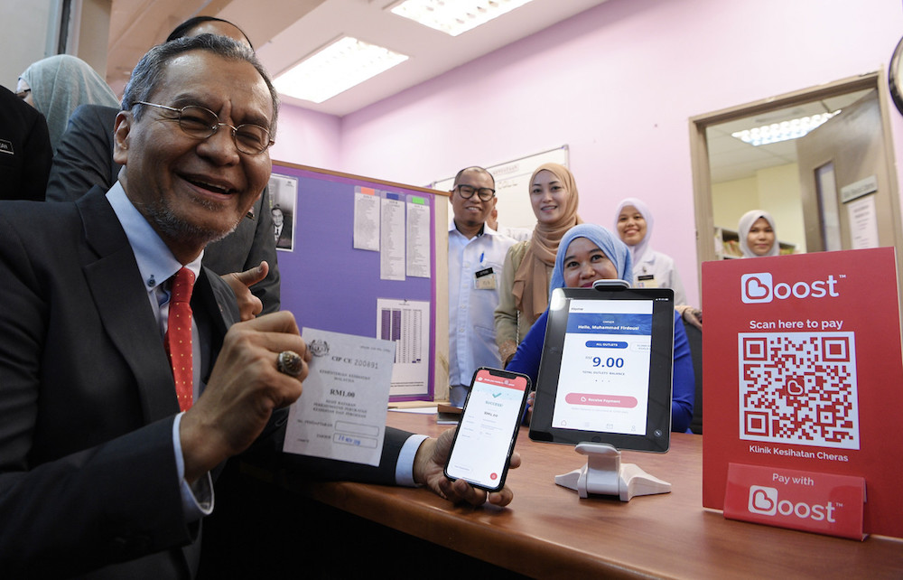 Health Minister Datuk Seri Dzulkefly Ahmad launches the e-wallet payment pilot project at the Cheras Health Clinic in Kuala Lumpur November 26, 2019. u00e2u20acu201d Bernama pic