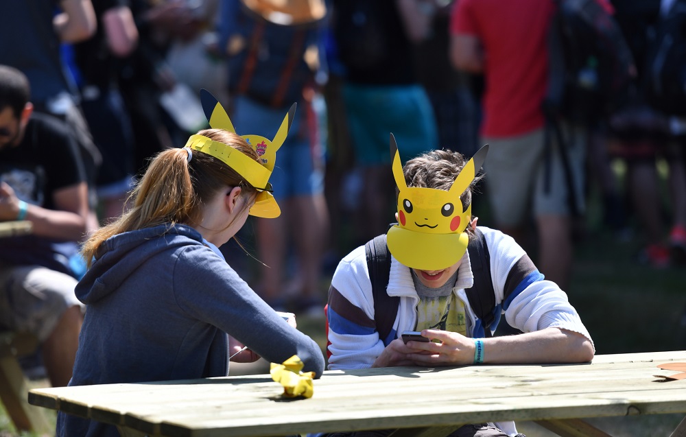 Visitors looking at their phones during a u00e2u20acu02dcPokemon Gou00e2u20acu2122 Festival at the Westfalenpark in Dortmund, Germany July 2019. u00e2u20acu201d AFP pic