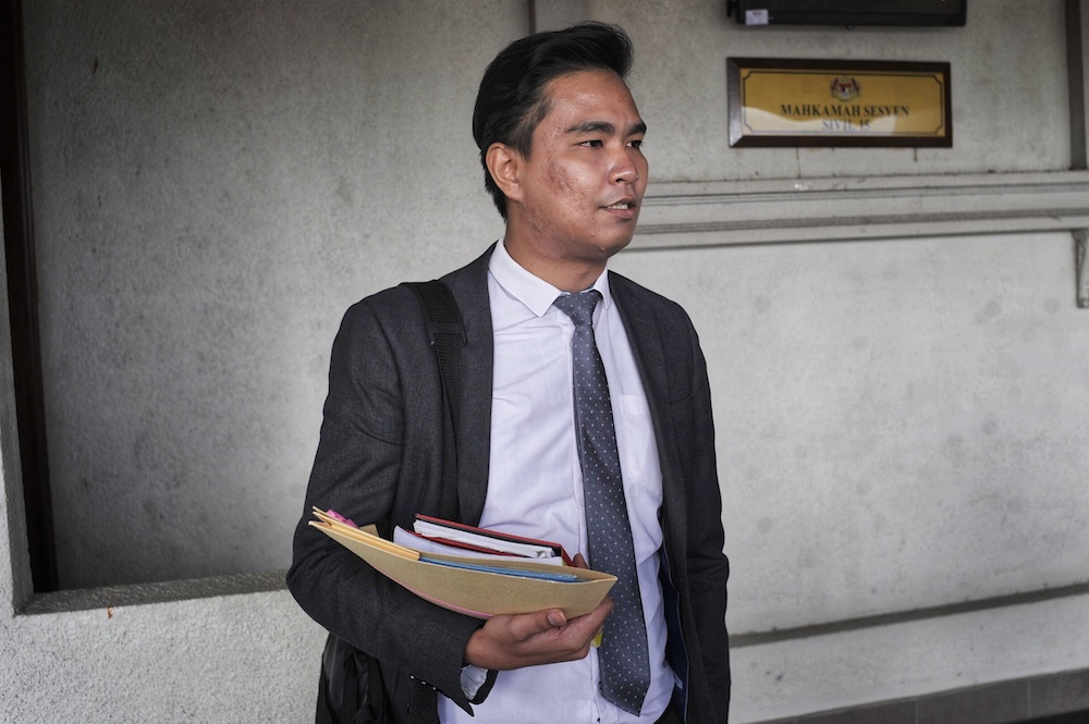 Zaid Malek speaks to reporters at the Kuala Lumpur High Court December 3, 2019. u00e2u20acu201d Picture by Shafwan Zaidon 