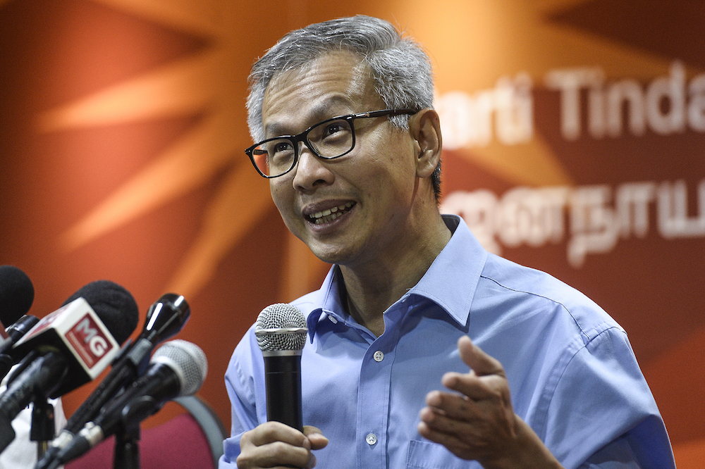 DAP’s Tony Pua says it is normal practice to refinance loans. — Picture by Miera Zulyana