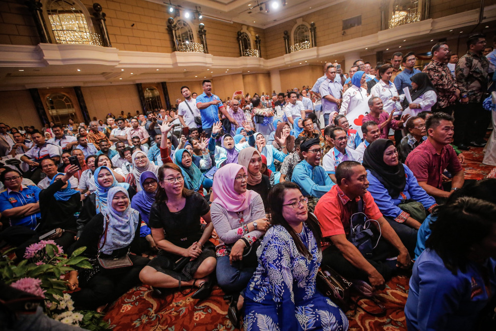 PKR supporters cheer while PKR deputy president Datuk Seri Azmin Ali is giving his speech during the ‘SPV 2030’ dinner at Hotel Renaissance Kuala Lumpur December 8, 2019. — Picture by Hari Anggara