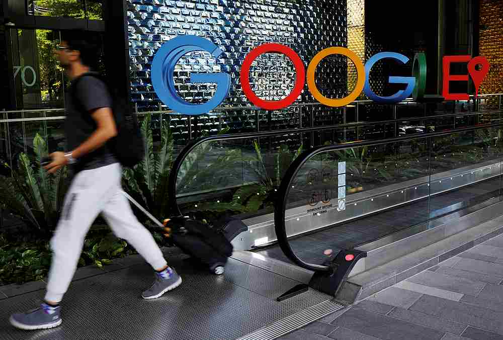 A man passes a Google signage outside their office in Singapore May 24, 2019. u00e2u20acu201d Reuters pic