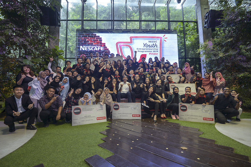 All Nescafe winners and runner-ups took the stage to celebrate their joint success in becoming entrepreneurs. u00e2u20acu201d Picture by Shafwan Zaidon 