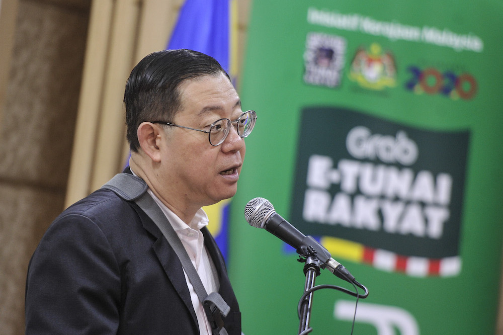 Finance Minister Lim Guan Eng speaks to reporters during the launch of e-Tunai Rakyat in Putrajaya January 14, 2020. — Picture by Shafwan Zaidon