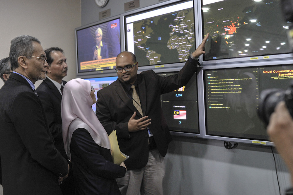 Health Minister Datuk Seri Dzulkefly Ahmad (left) and Deputy Prime Minister Datuk Seri Dr Wan Azizah Wan Ismail (centre) listen to a briefing during a visit to the National Crisis Preparedness and Response Centre (CPRC) in Putrajaya January 29, 2020. — Picture by Shafwan Zaidon