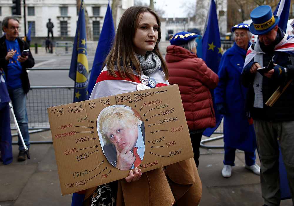 An anti-Brexit protester holds a sign near Downing Street in London, Britain January 8, 2020. u00e2u20acu201d Reuters pic
