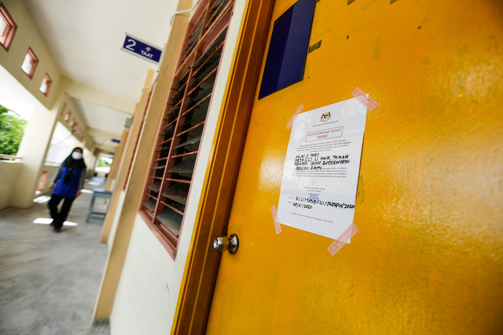 A notice of closure is seen on the door of a classroom at SJK (C) Li Hwa in Butterworth January 8, 2020. u00e2u20acu201d Picture by Sayuti Zainudin