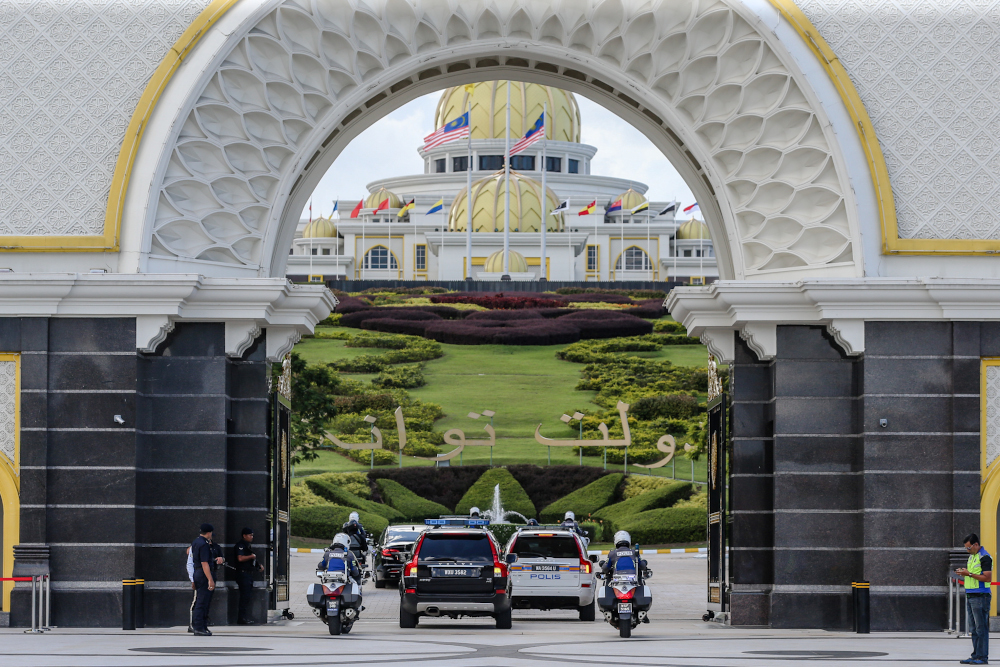 Luxury vehicles believed to be carrying senior political leaders arrive at Istana Negara February 24, 2020. — Picture by Firdaus Latif