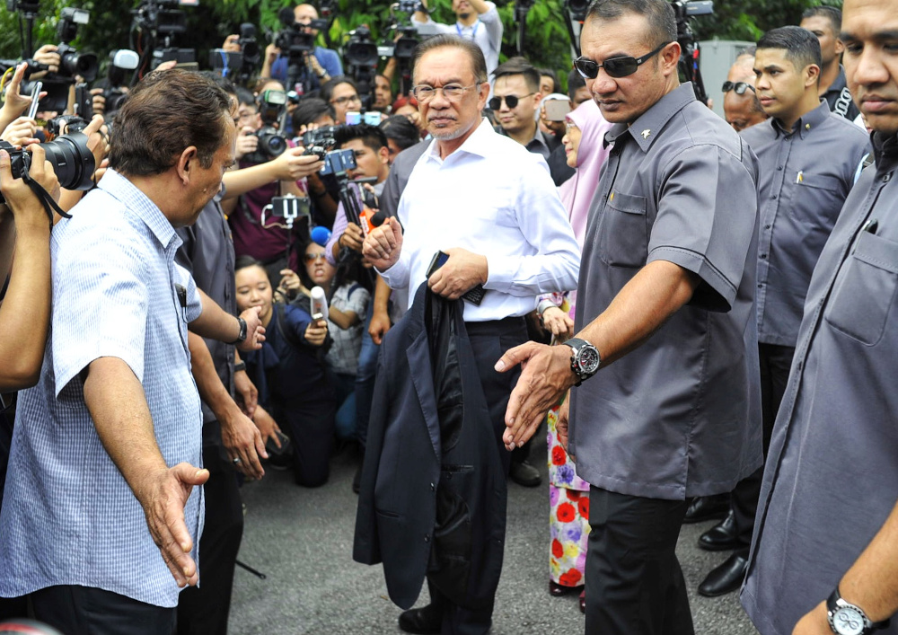 Datuk Seri Anwar Ibrahim speaks to reporters gathered outside his residence in Kuala Lumpur February 26, 2020. u00e2u20acu201d Picture by Shafwan Zaidon