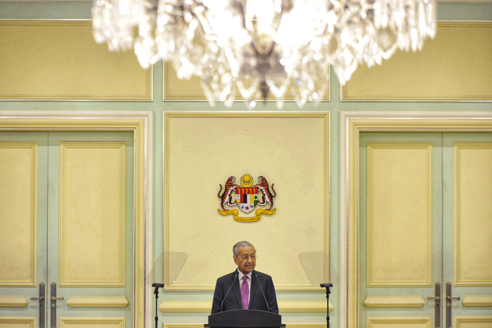 Interim Prime Minister Tun Mahathir Mohamad speaks during the economic stimulus package announcement at Perdana Putra building in Putrajaya February 27, 2020. u00e2u20acu201d Picture by Shafwan Zaidon