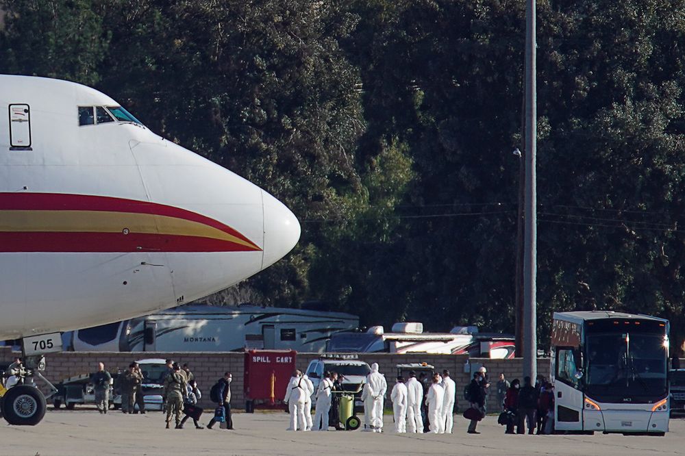 Passengers board buses after arriving on an aircraft, chartered by the US State Department to evacuate government employees and other Americans from Wuhan, at March Air Reserve Base California, January 29, 2020. u00e2u20acu201d Reuters pic