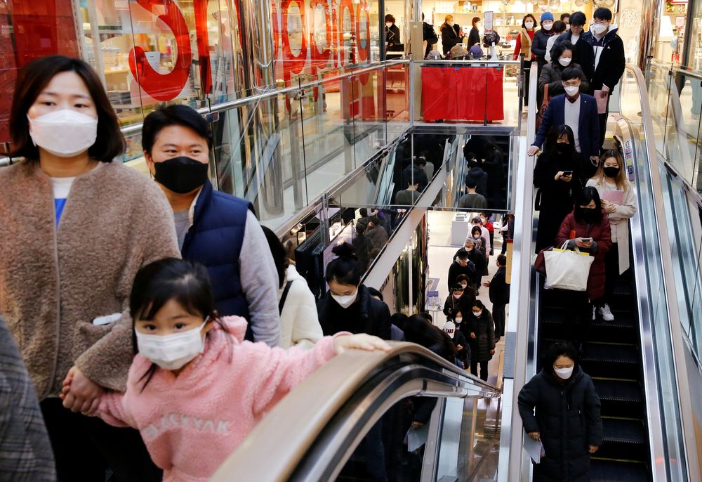 People wearing masks to prevent contracting the coronavirus take the elevator to buy masks at a department store in Seoul, South Korea February 27, 2020. u00e2u20acu201d Reuters pic