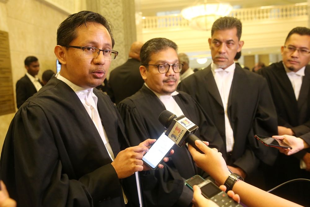 Lawyer Datuk Ikbal Salam (left) speaks to reporters at the Federal Court in Putrajaya February 13, 2020. u00e2u20acu2022 Picture by Choo Choy May