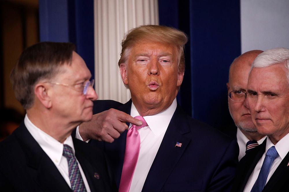 US President Donald Trump and Vice President Mike Pence (right) are seen just before the conclusion of the news conference on the coronavirus outbreak at the White House in Washington February 26, 2020. u00e2u20acu201d Reuters pic