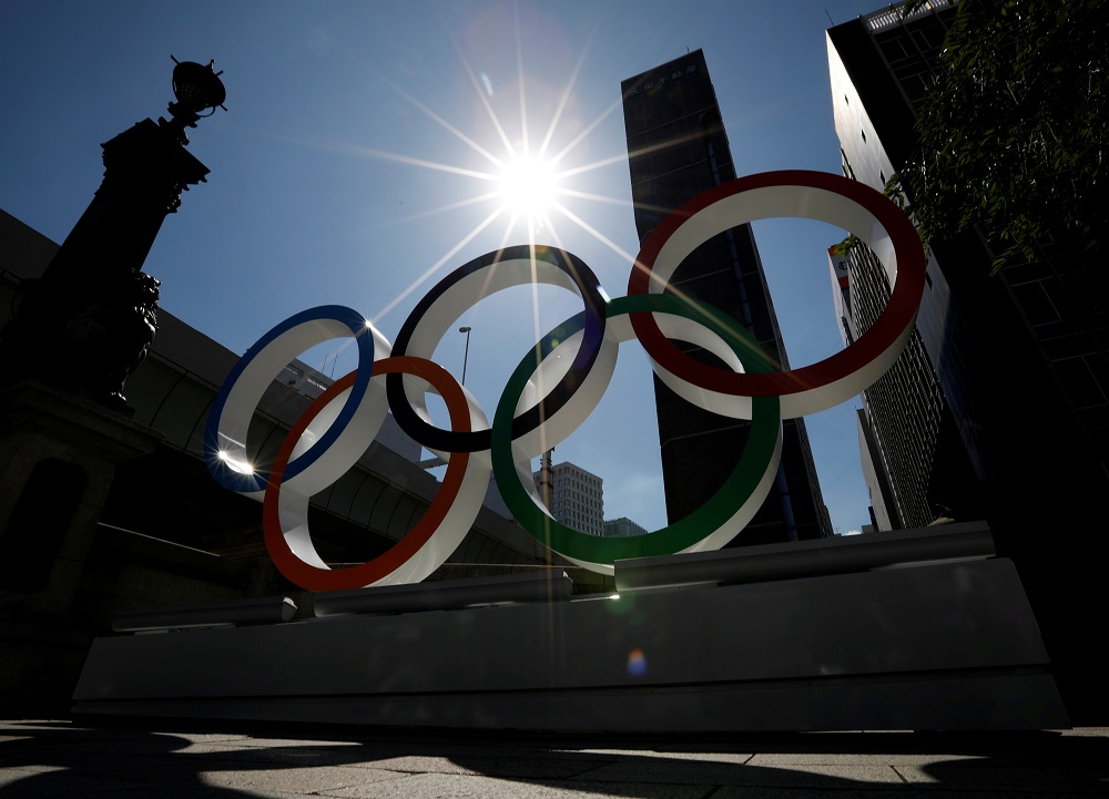 Summer sunshine is seen through Olympic rings displayed at Nihonbashi district in Tokyo August 5, 2019. u00e2u20acu201d Reuters pic