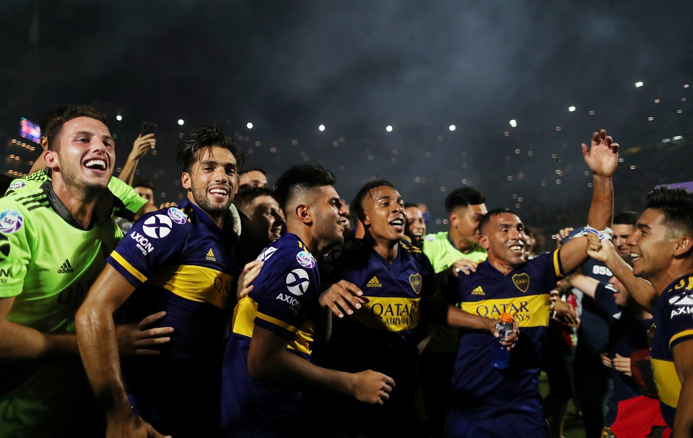nBoca Juniors' Carlos Tevez, Emmanuel Mas with teammates celebrate after winning the Superliga in Beunos Aires March 7, 2020. u00e2u20acu201d Reuters pic n