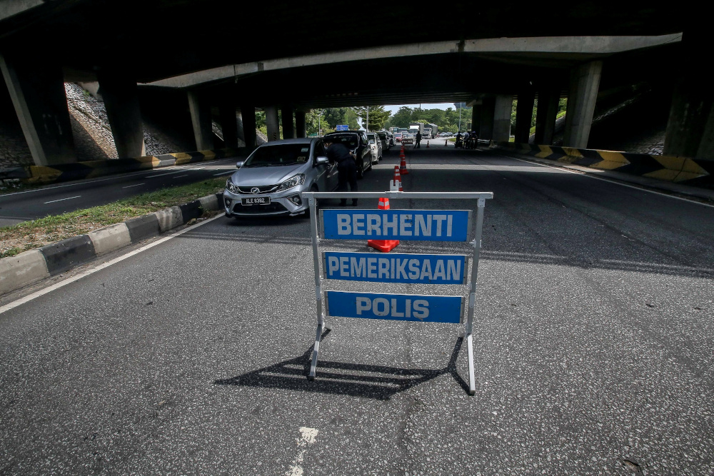 A police road block is seen at Jalan Kuala Kangsar following the movement control order to curb the spread of Covid-19 infection March 20, 2020. u00e2u20acu201d Picture by Farhan Najib