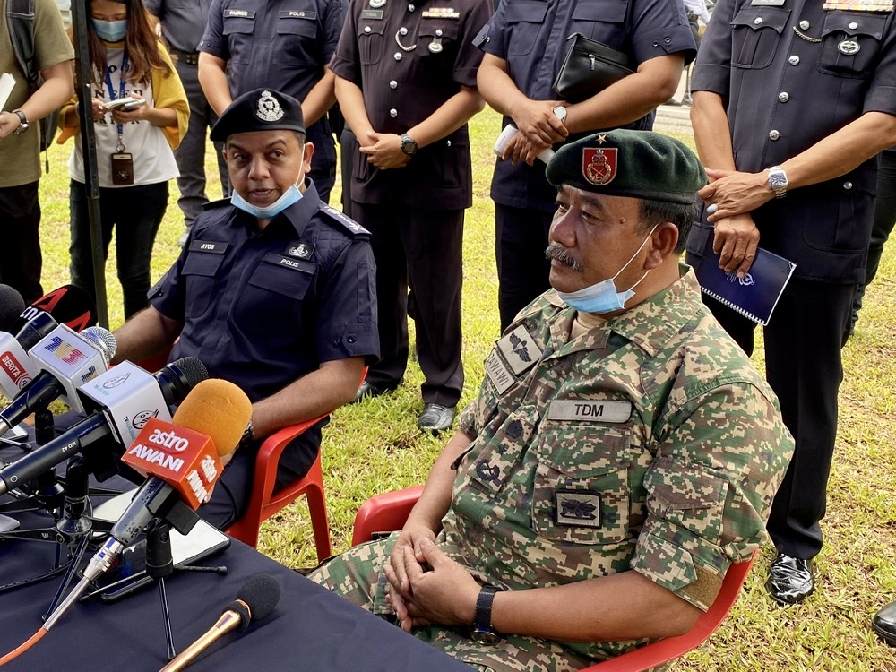 Johor police chief Datuk Ayob Khan Mydin Pitchay (left) and the armyu00e2u20acu2122s Seventh Infantry Brigade in Johor commander Brigadier General Datuk Zawawi Adam during a press conference in Johor Baru March 23, 2020. u00e2u20acu201d Picture by Ben Tan