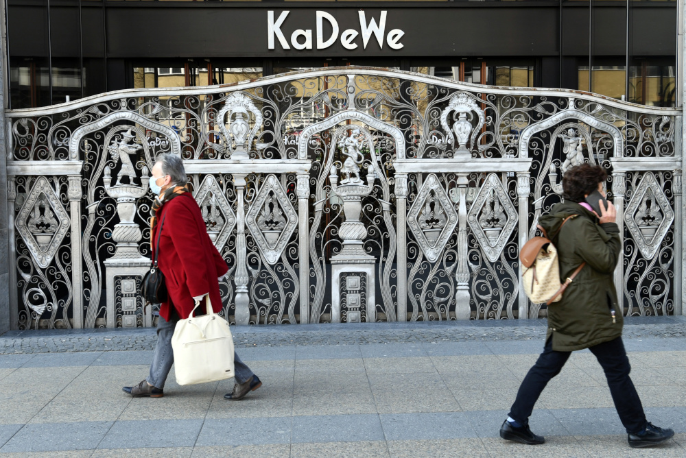 People walk past Berlin’s famous KaDeWe shopping centre on the Kurfuerstendamm boulevard during the spread of coronavirus disease in Berlin, Germany, March 26, 2020. The GfK survey of some 2,000 people found that respondents were more pessimistic about Germany’s economic prospects as well as their own income expectations. — Reuters pic
