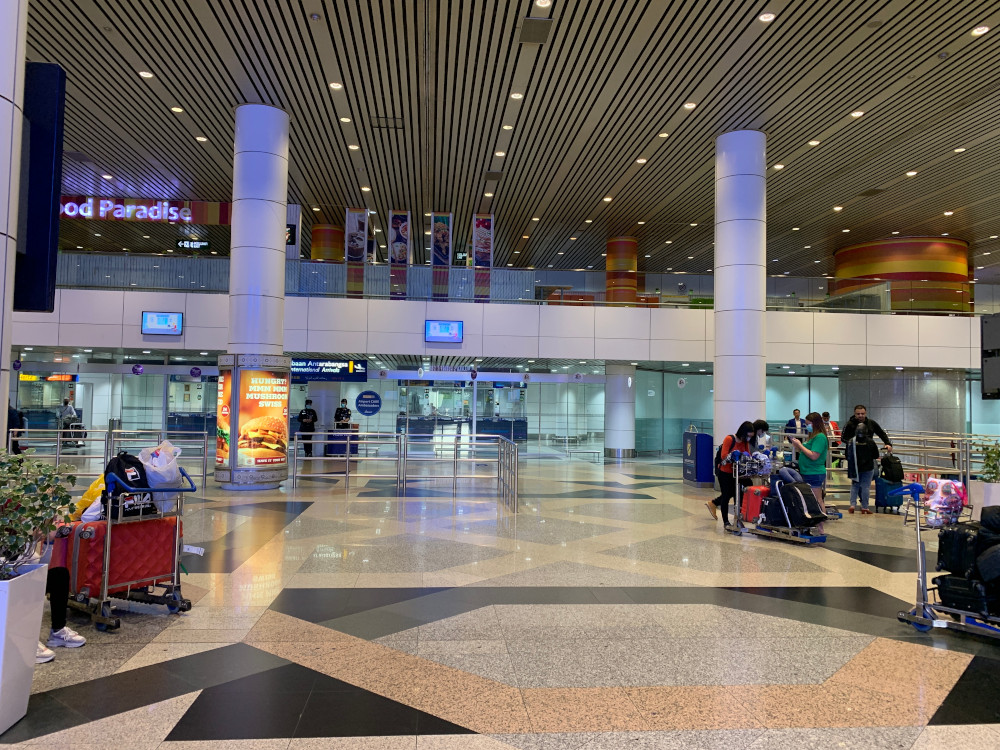 Ghost airport: Very few Malaysian passengers seen waiting around at the arrival area. — Picture by Thasha Jayamanogaran