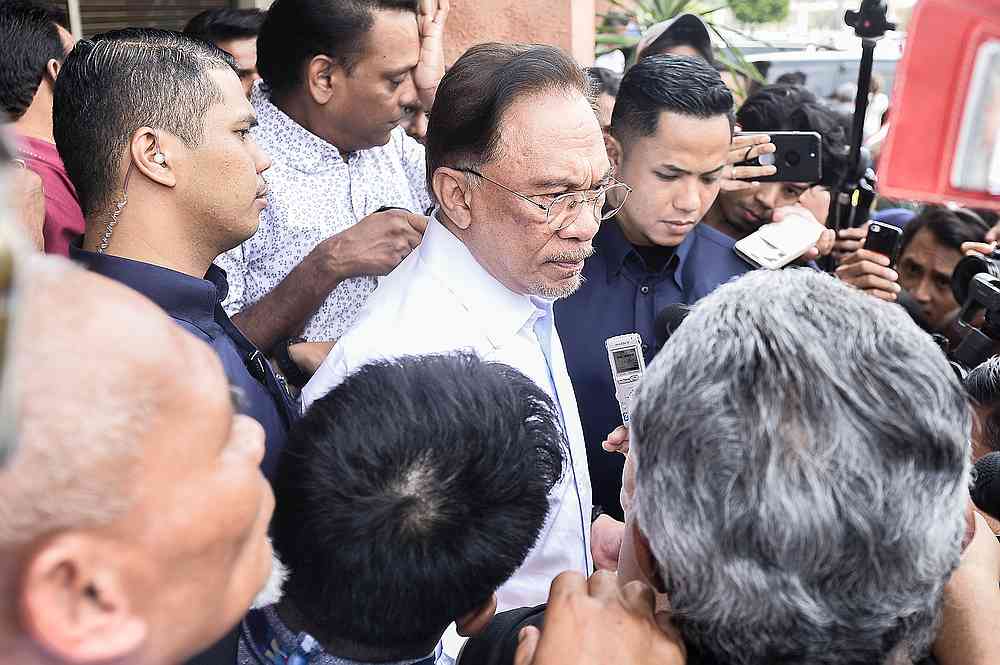 PKR president Datuk Seri Anwar Ibrahim leaving PKR hq in Petaling Jaya March 1, 2020. u00e2u20acu201d Picture by Miera Zulyana