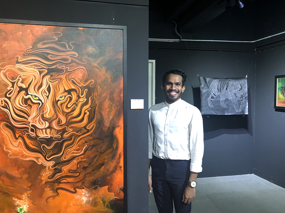 'BELANG' exhibition curator Ivan Gabriel wants to tell the story of the Malayan tigers in the exhibition. — Picture by Opalyn Mok