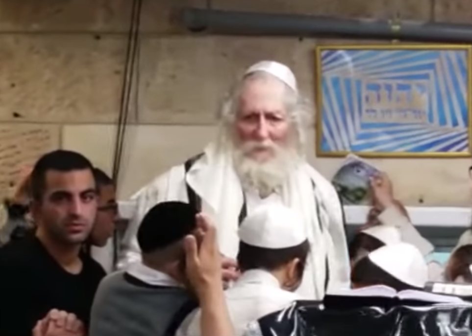 Screengrab from the YouTube video: Rabbi Eliezer Berland Is Back In Business.