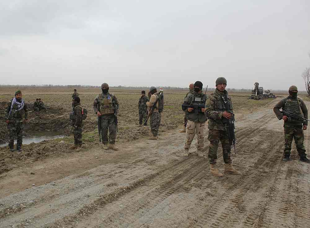 Afghan National Army (ANA) soldiers arrive at the site of last night clashes between Taliban and Afghan forces in Kunduz, Afghanistan March 4, 2020. u00e2u20acu201d Reuters pic