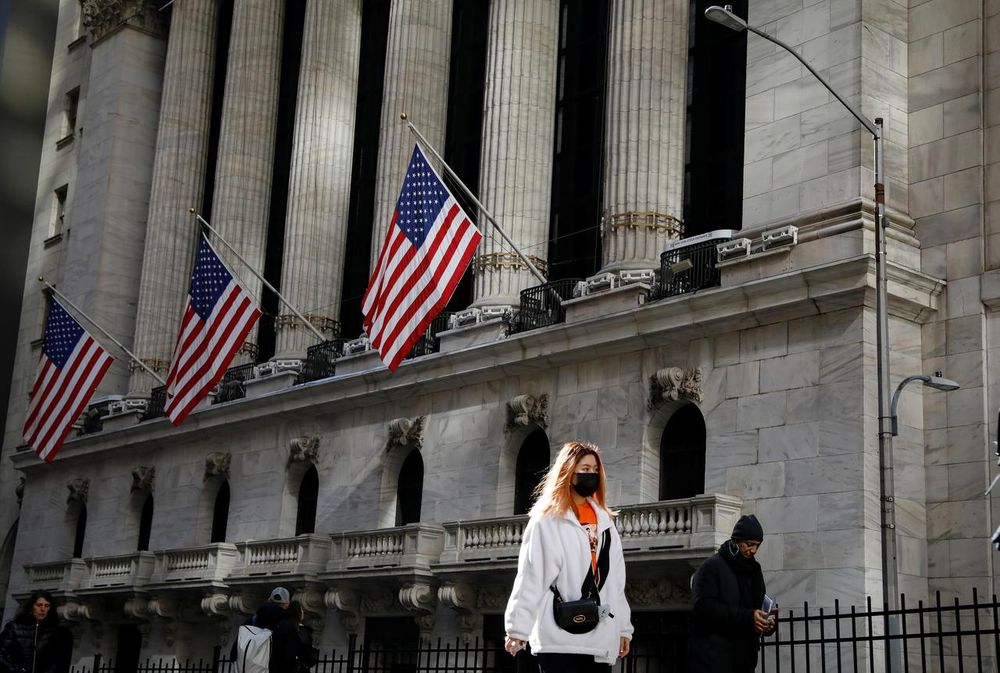 A woman wears a mask near the New York Stock Exchange (NYSE) in the Financial District in New York, US, March 4, 2020. u00e2u20acu201d Reuters pic
