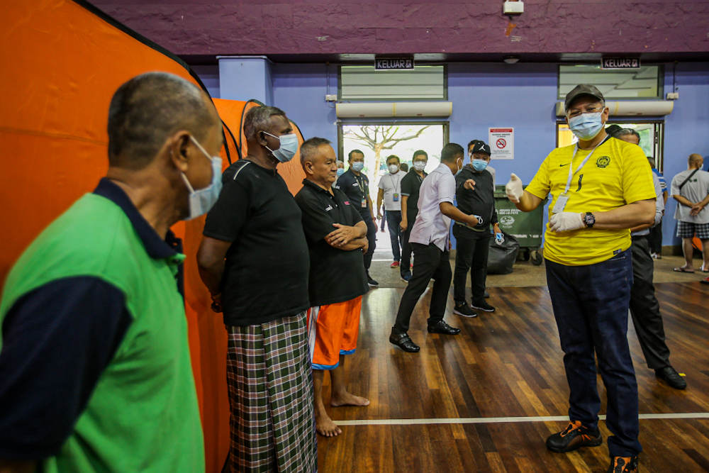 Federal Territories Minister Tan Sri Annuar Musa visits the homeless at the temporary shelter in Pusat Komuniti Sentul Perdana, Kuala Lumpur April 7, 2020. u00e2u20acu201d Picture by Hari Anggara