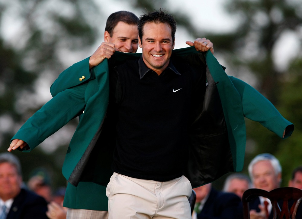 Trevor Immelman (right) of South Africa receives the green jacket from former champion Zach Johnson (left) after Immelman won the 2008 Masters golf tournament at the Augusta National Golf Club in Augusta, Georgia April 13, 2008. — Reuters pic